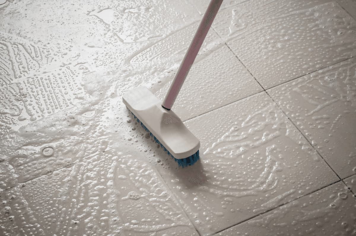 Step 1 – Cleaning Tile Surface with Stellmann Prep Cleaner Before Applying Non-Slip Coating | Essential for Bonding & Safety Performance