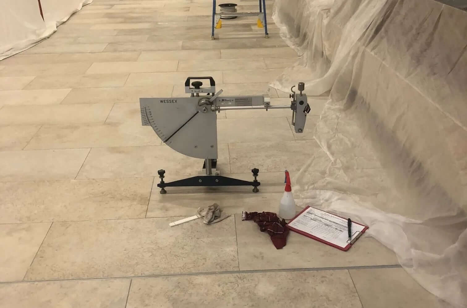 Quick Solutions for a Failed Slip Test: How to Achieve AS 4586 Compliance - slip resistance testing equipment on tiled floor.