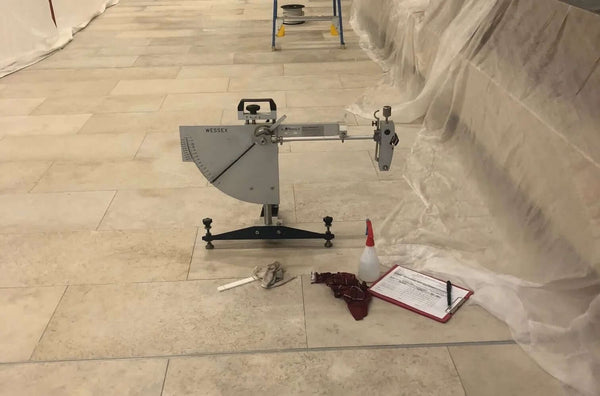 Quick Solutions for a Failed Slip Test: How to Achieve AS 4586 Compliance - slip resistance testing equipment on tiled floor.