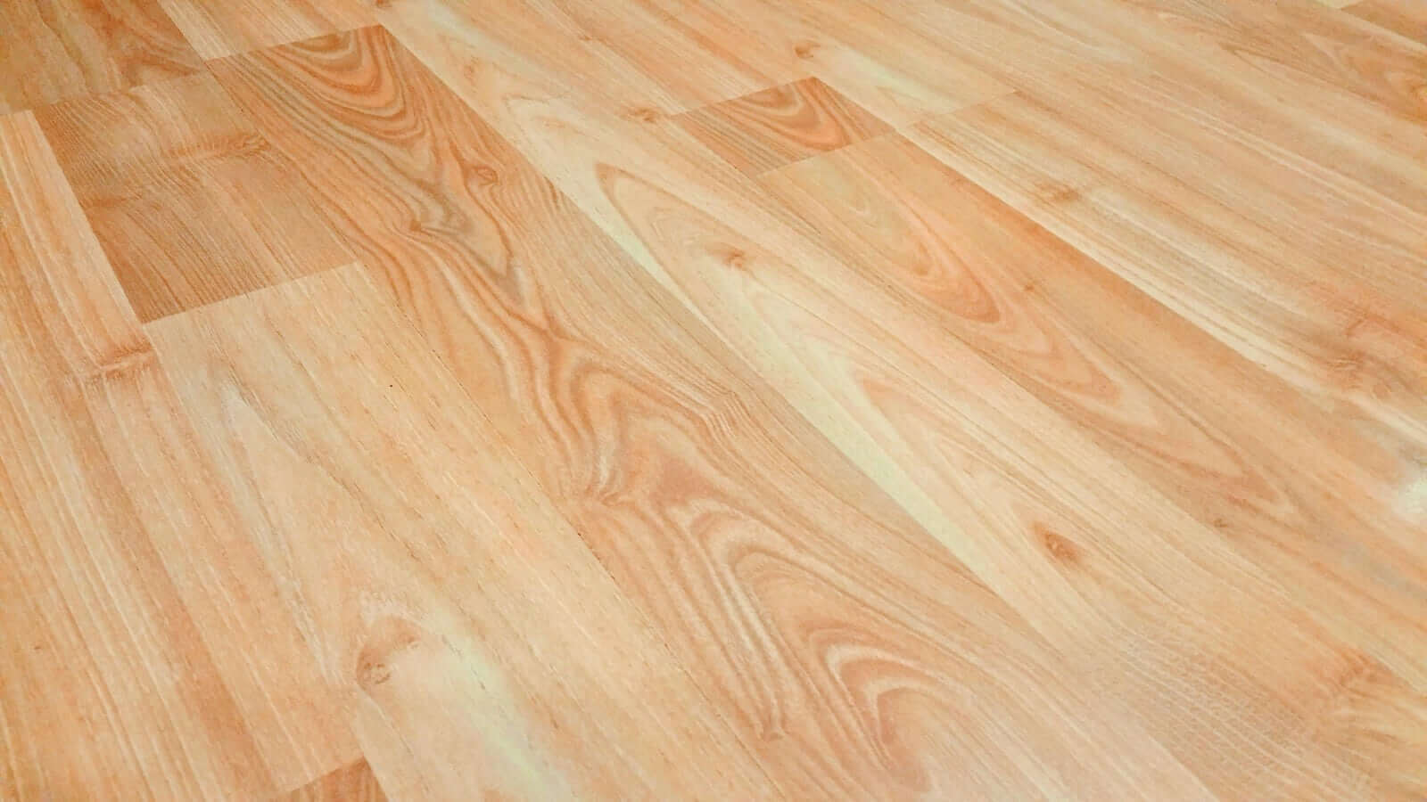 Vinyl Flooring Safety in Aged Care: AS4586 Compliance Guide - non-slip floor coating on warm wood look vinyl.