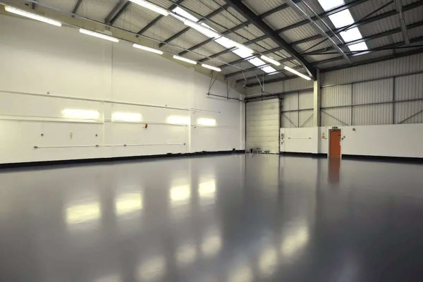 Can You Apply an Anti-Slip Coating Over Existing Paint in High-Foot-Traffic Areas? non-slip floor coating in a commercial space.