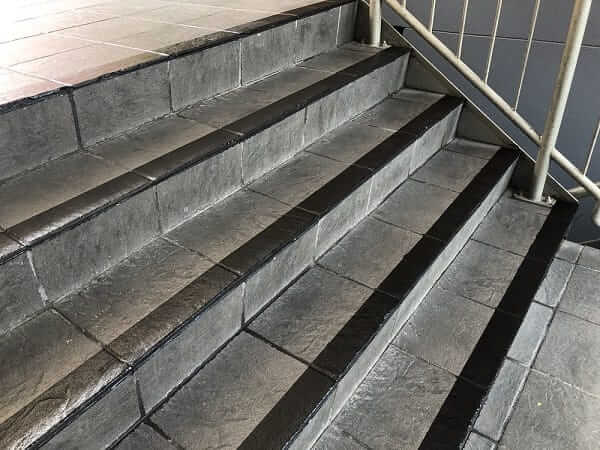 Anti-Slip Stair Tread Nosing Without Drilling: AS1428 Compliance Guide for Commercial Properties on stairway surface.