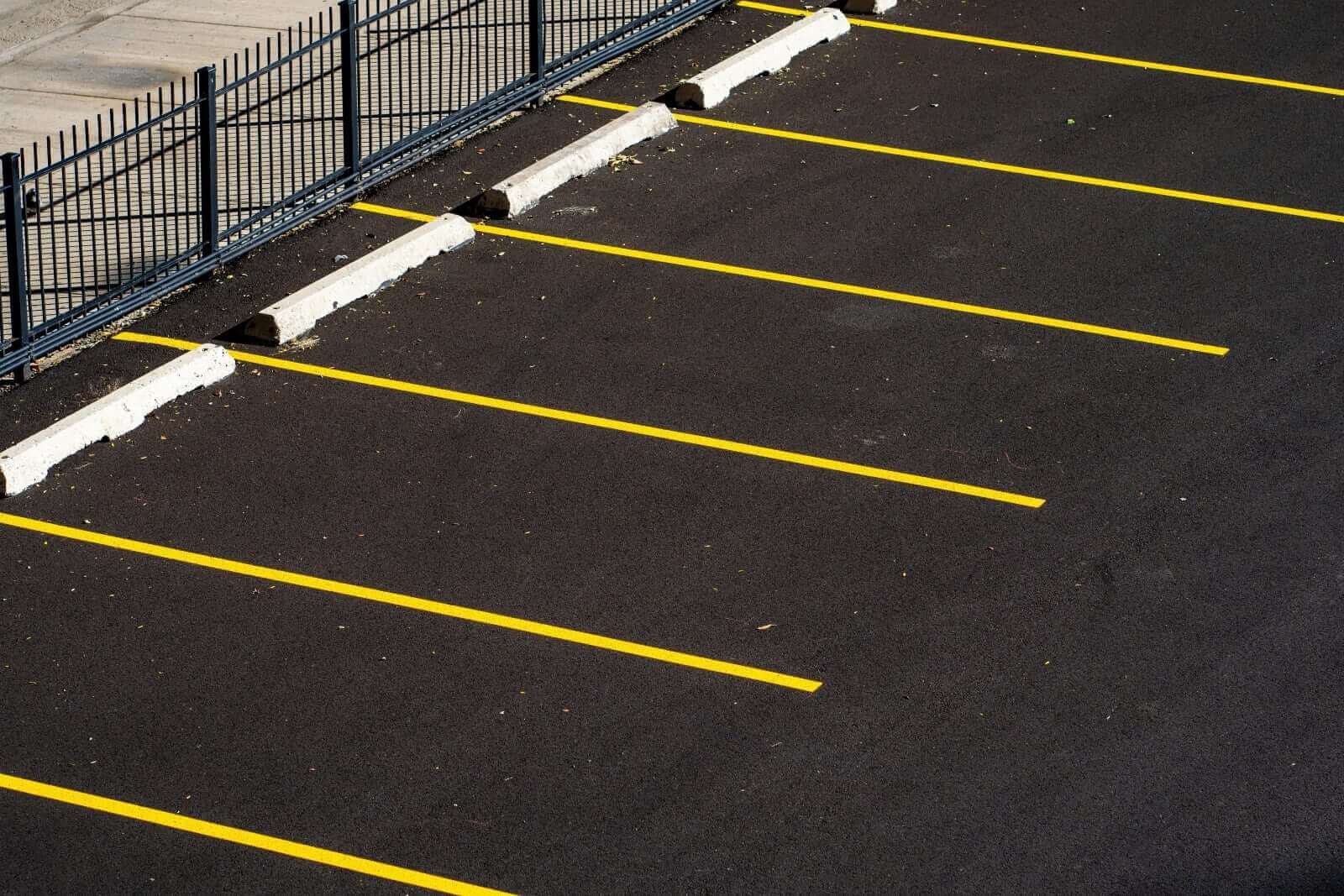 Line Marking Compliance Australia: Standards, Surface Prep & Best Practices - yellow lines in a parking lot