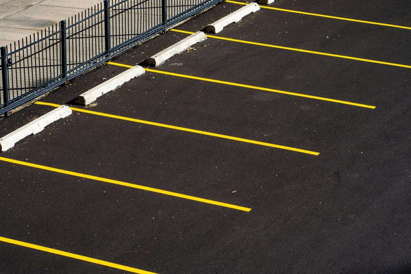 Line Marking Compliance Australia: Standards, Surface Prep & Best Practices - yellow lines in a parking lot