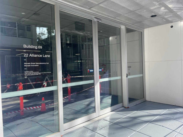 Revolutionising Sustainability and Safety: Stellmann Aqualine at Monash University’s Smart Manufacturing Hub entrance with non-slip floor coating.