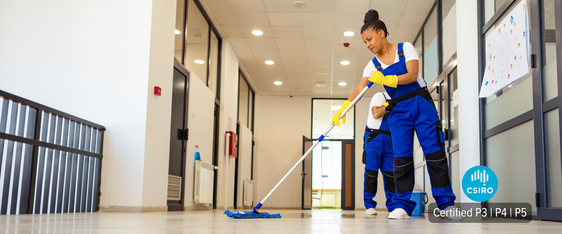 Commercial cleaning staff maintaining anti-slip coated floor – CSIRO certified P3 P4 P5 slip resistance for schools, offices, and public buildings