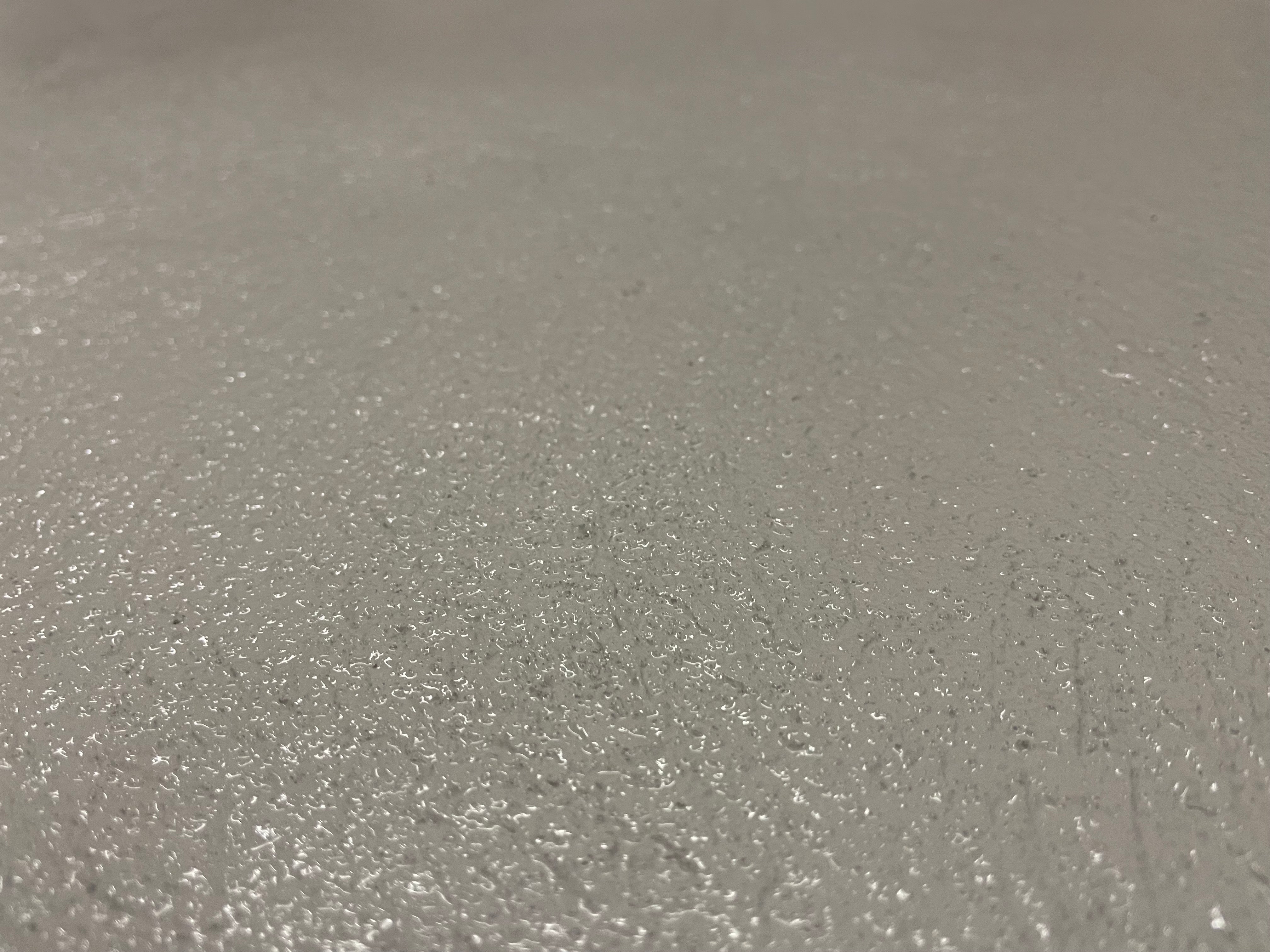 Semi-gloss clear non-slip coating over epoxy floor – durable, CSIRO-certified finish ideal for commercial kitchens, garages, and workshops, compliant with AS 4663 slip rating