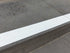 Outdoor steps coated with grey slip-resistant surface and white Stellmann non-slip nosing for contrast and fall prevention