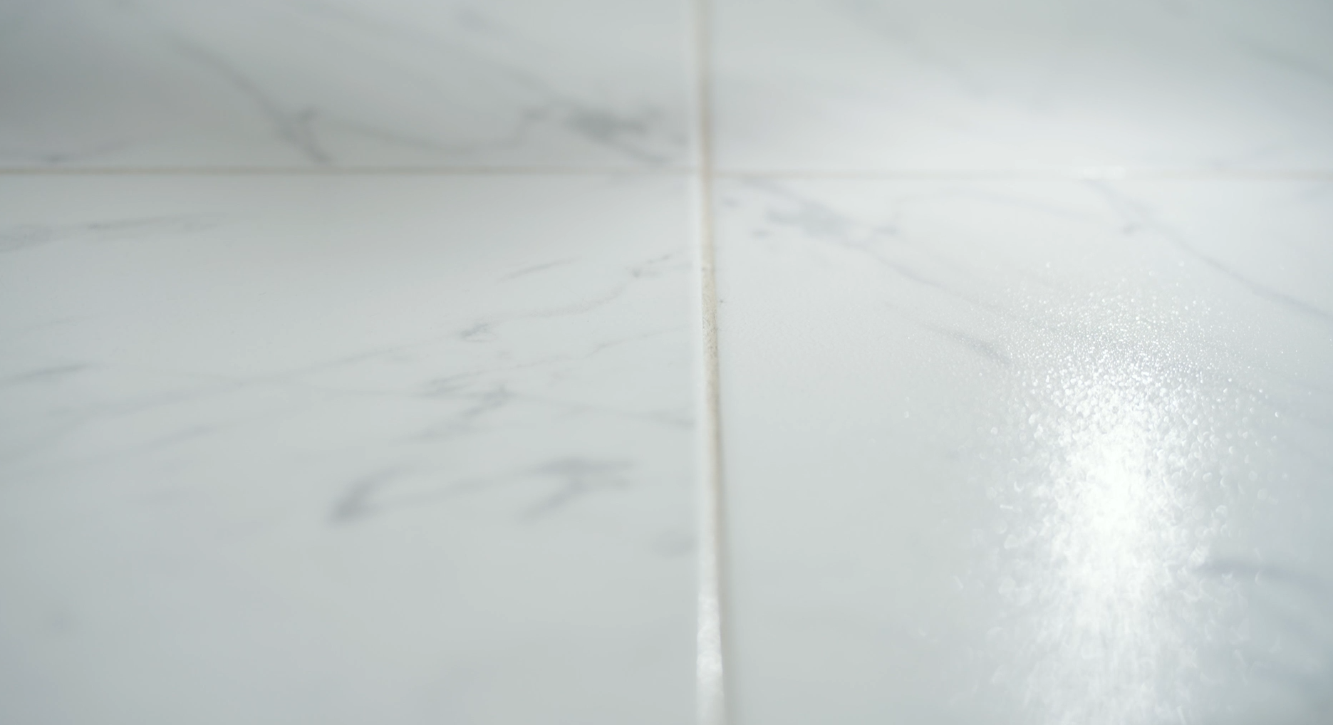 Close-up of anti-slip coated bathroom tiles with CSIRO-certified Stellmann clear treatment – enhances grip without changing appearance