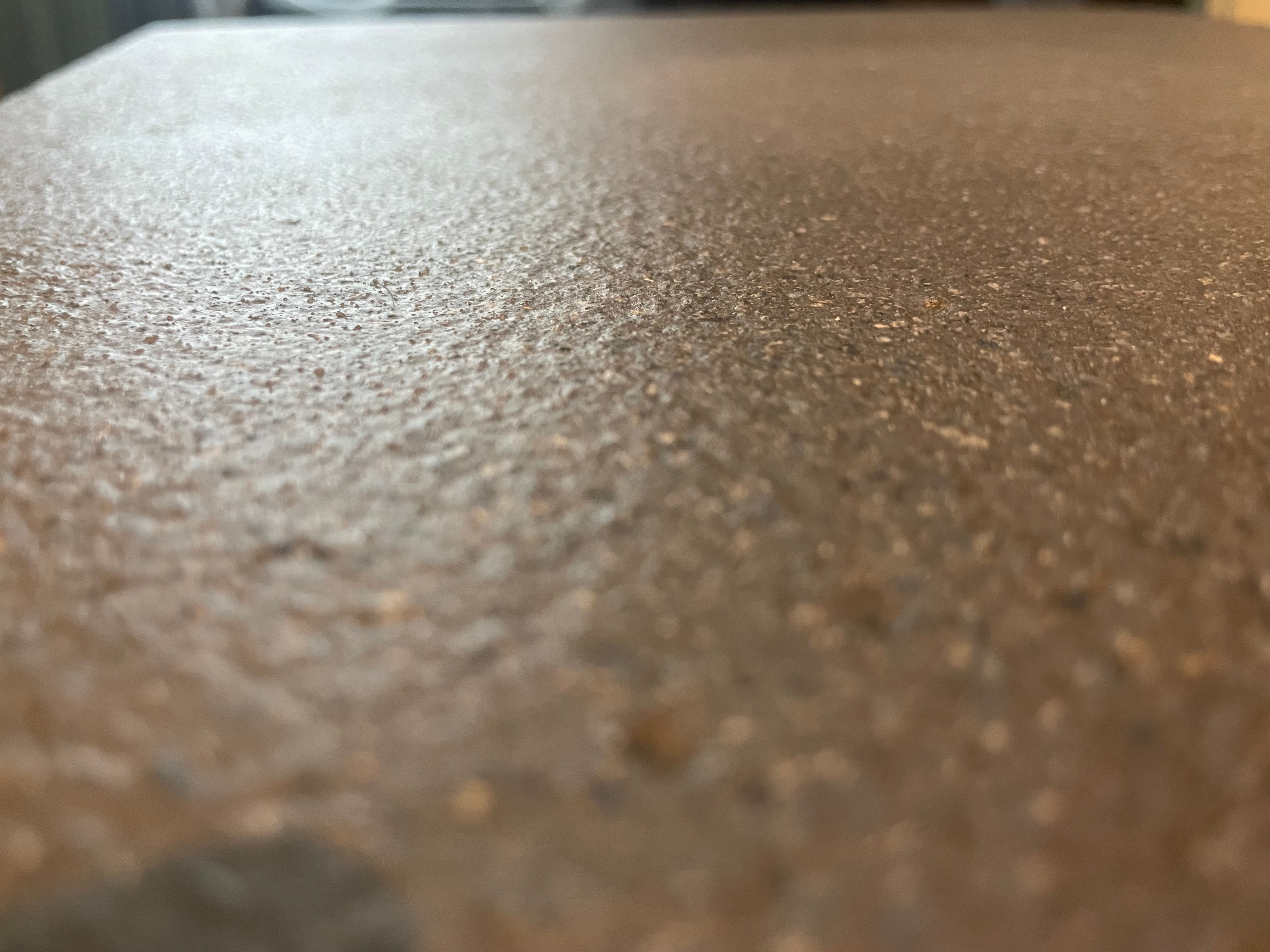 Close-up of concrete surface finished with Stellmann clear non-slip coating – CSIRO-certified P5 anti-slip treatment for commercial and residential safety