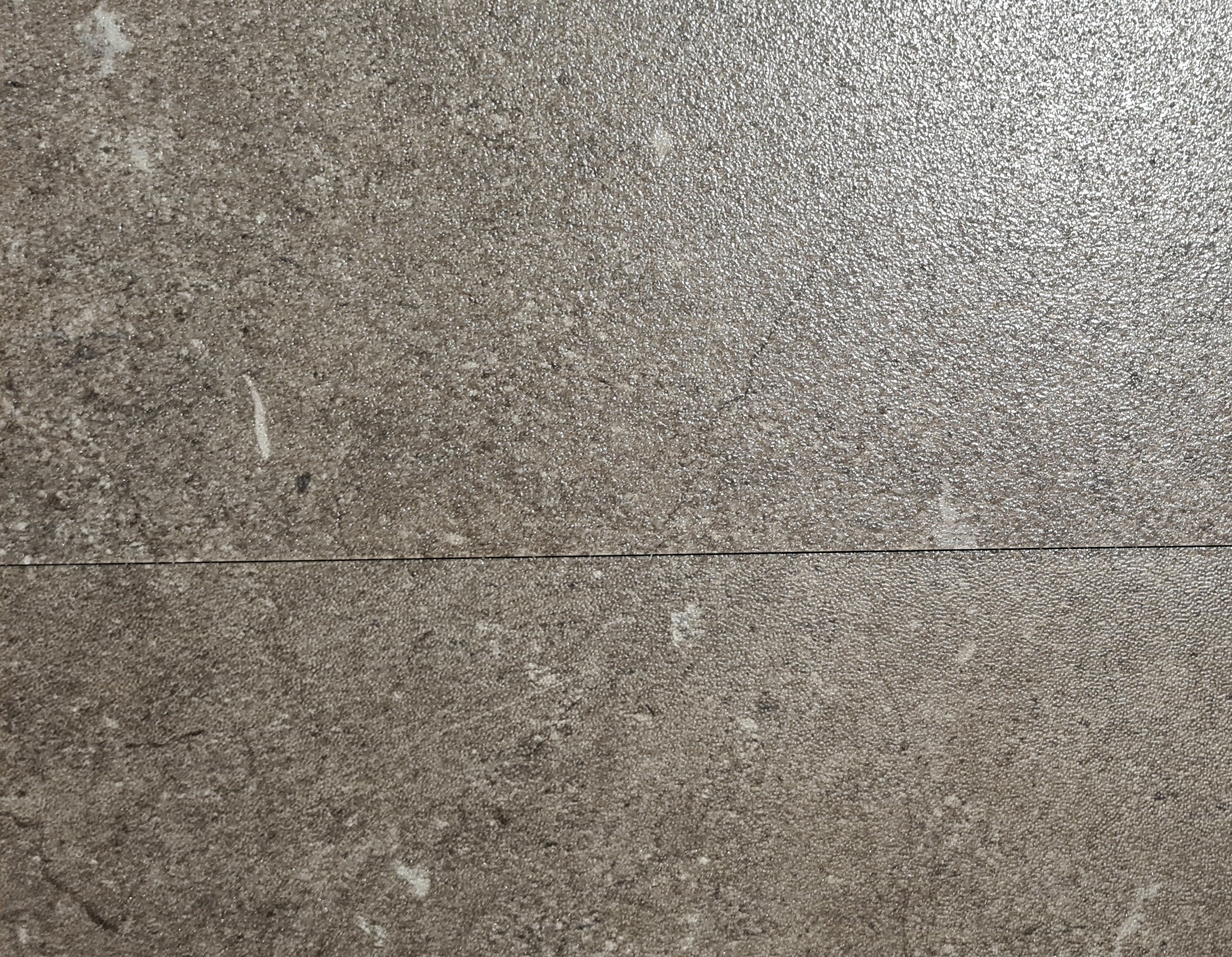 Textured anti-slip vinyl flooring with matte finish, ideal for wet areas, bathrooms, and NDIS home modifications – slip-resistant to AS 4586 standards