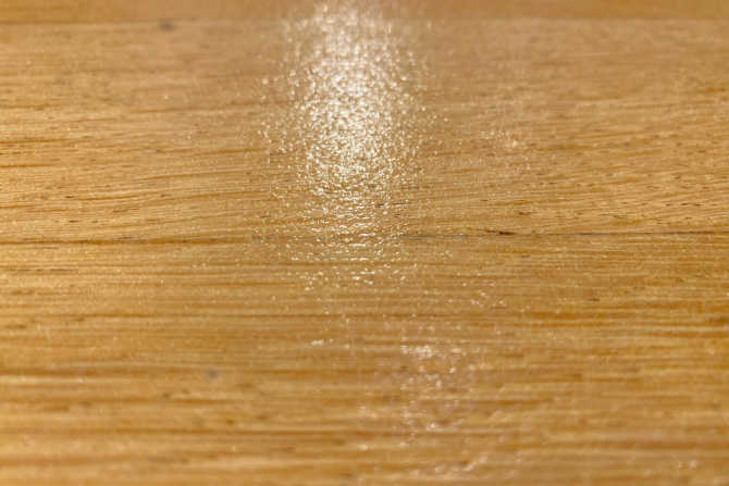 Close-up of timber flooring protected with Stellmann’s clear anti-slip coating – transparent, CSIRO-rated P3 solution for wood surfaces in wet and high-traffic areas
